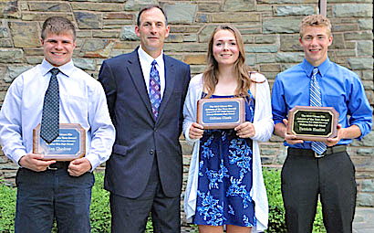 Athletes of the Year Ian Chedzoy (left), Gillian Clark and Patrick Hazlitt pose with Mike Stamp of E.C. Cooper Insurance, which sponsors the awards.
