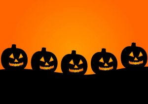 Five black Jack-o'-lanterns in a row with an orange-yellow background